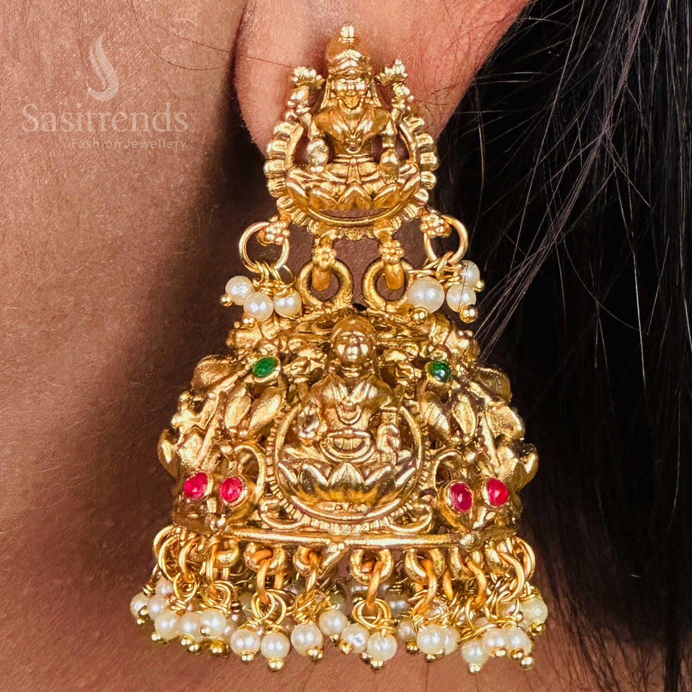 Bridal Lakshmi pearl jhumka earrings in matte gold with temple elegance, exuding royal charm and traditional heritage flair, perfect for wedding bliss by Sasitrends