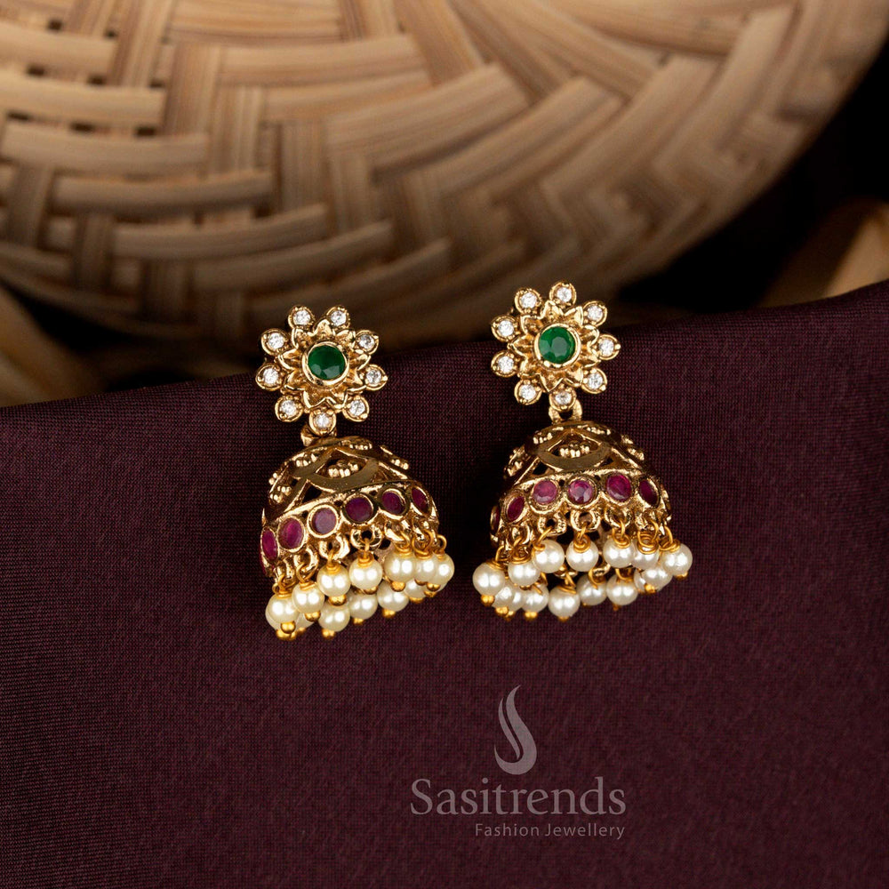 Ornate matte gold floral stud temple jhumka earrings with pearl drops sasitrends