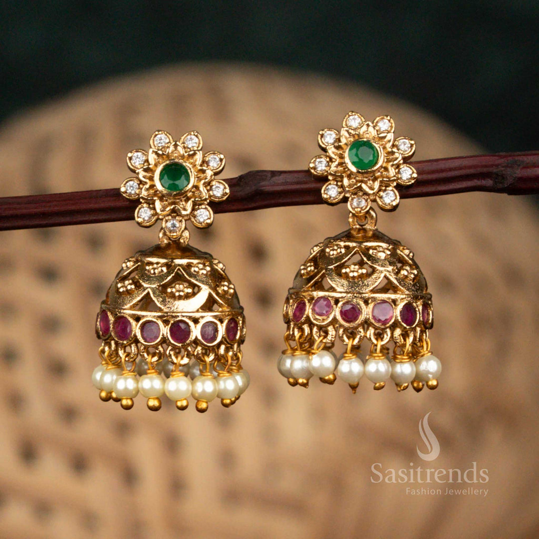 Ornate matte gold floral stud temple jhumka earrings with pearl drops sasitrends