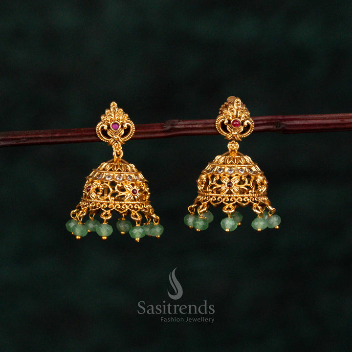 Filigree Matte Gold Plated Floral Stud Temple Jhumka Earrings with Dome Design and Bead Drops by Sasitrends