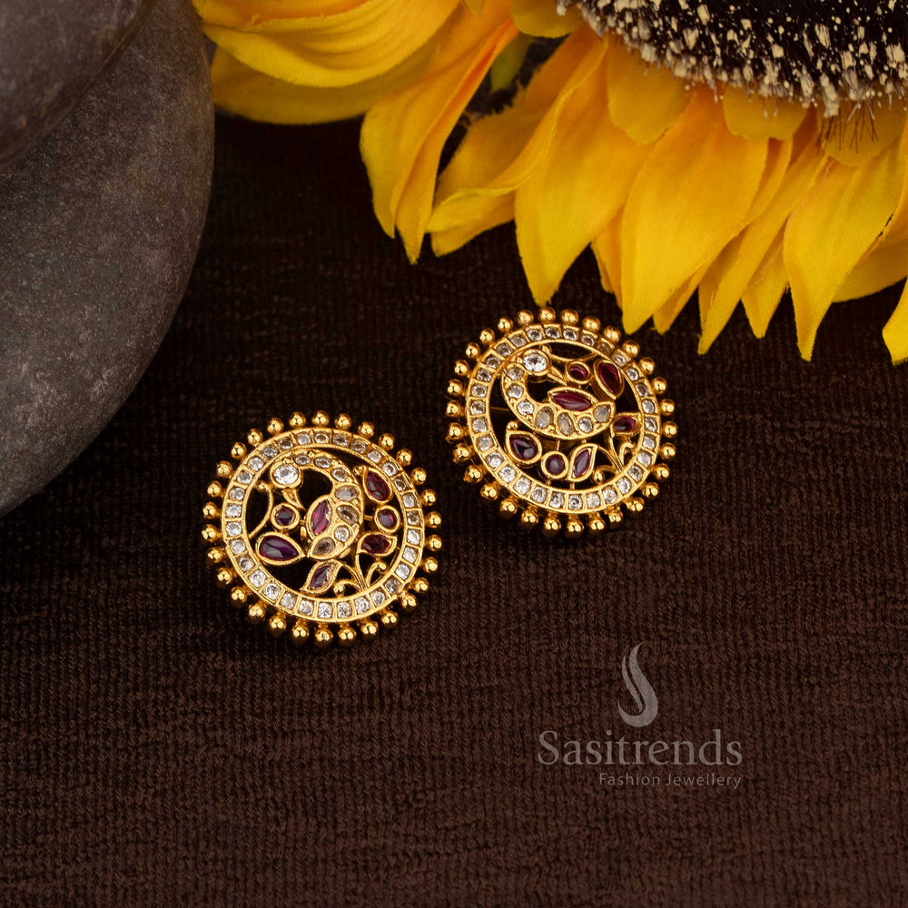 Graceful matte gold plated peacock kemp round stud earrings in white ruby colour for cultural celebrations - Sasitrends