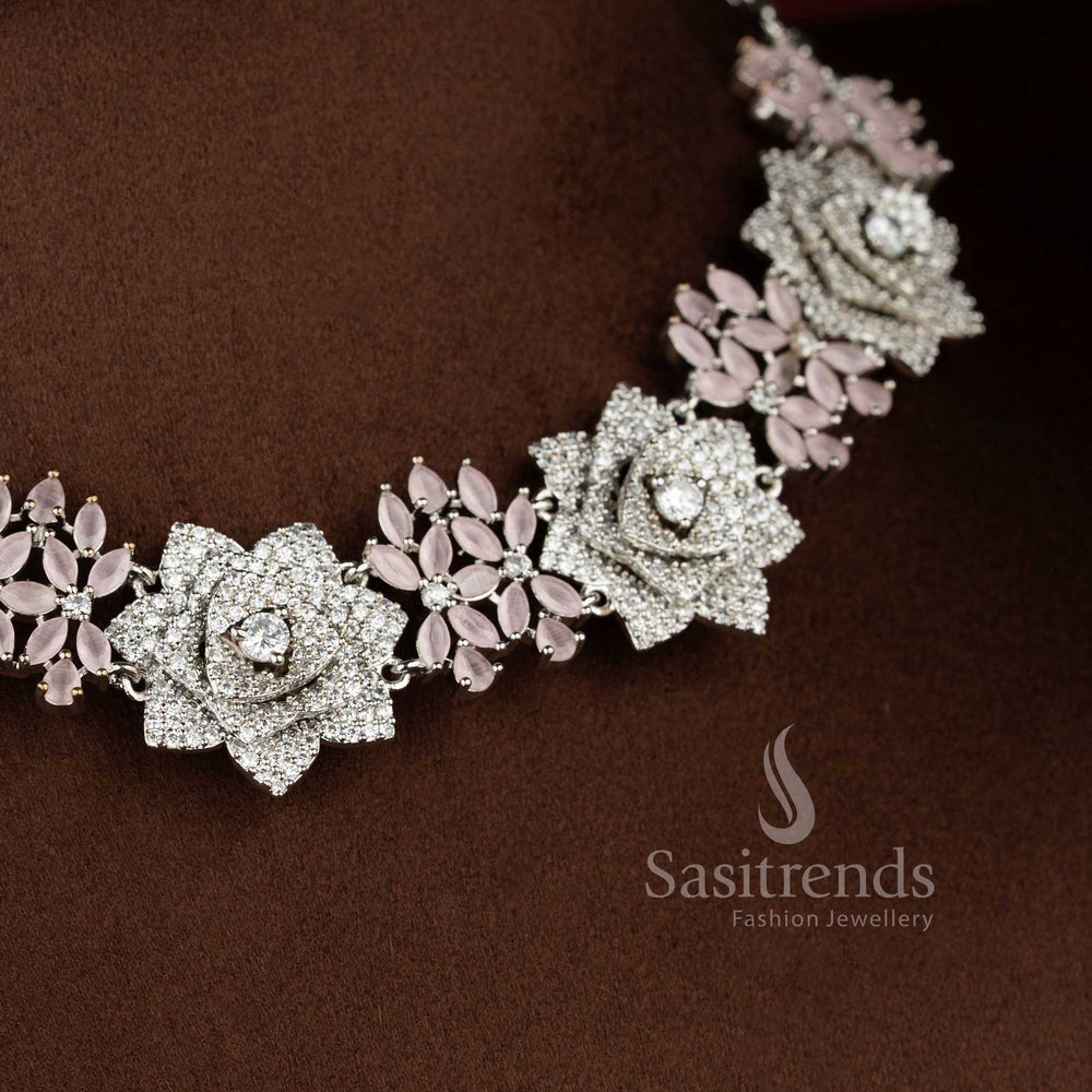Blush rose opulence radiates through this grand floral design American diamond jewellery set in baby-pink with rhodium silver plating, ideal for high society celebrations – Sasitrends