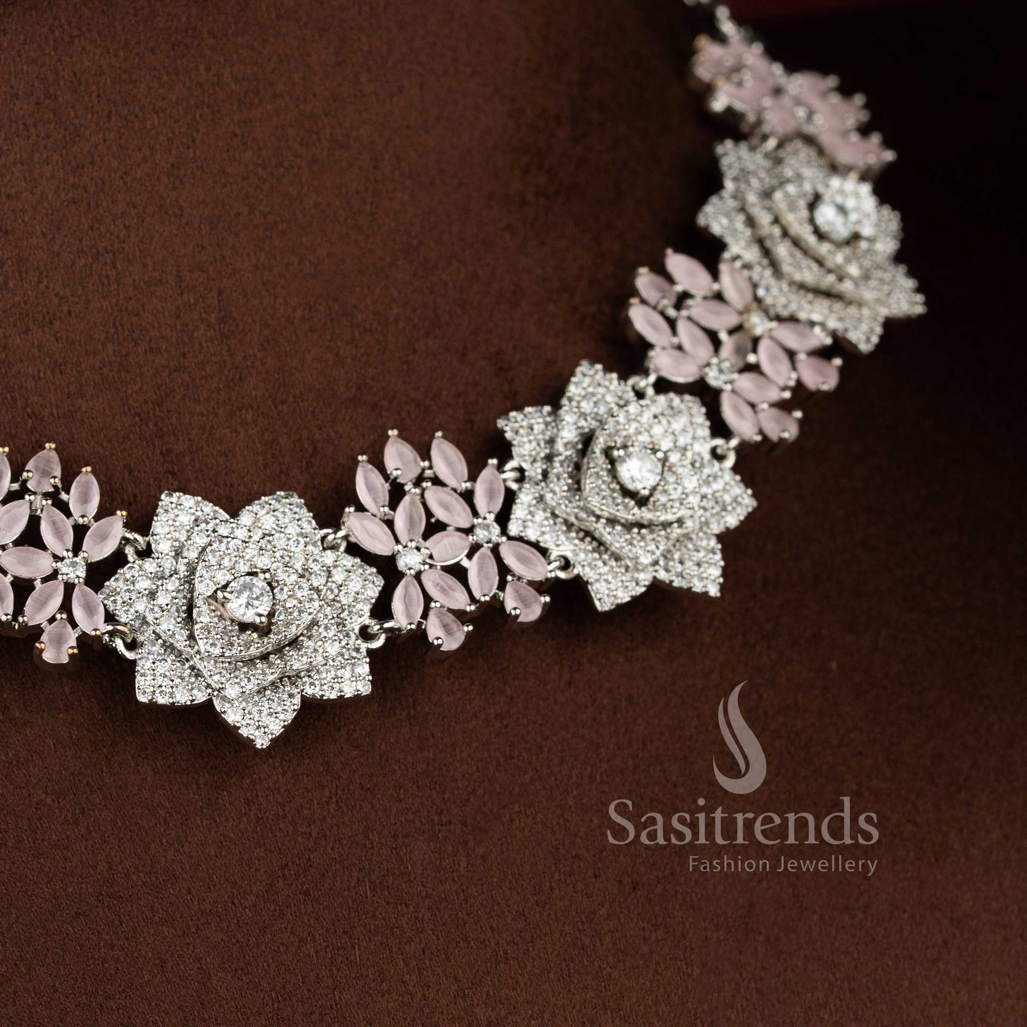 Blush rose opulence radiates through this grand floral design American diamond jewellery set in baby-pink with rhodium silver plating, ideal for high society celebrations – Sasitrends