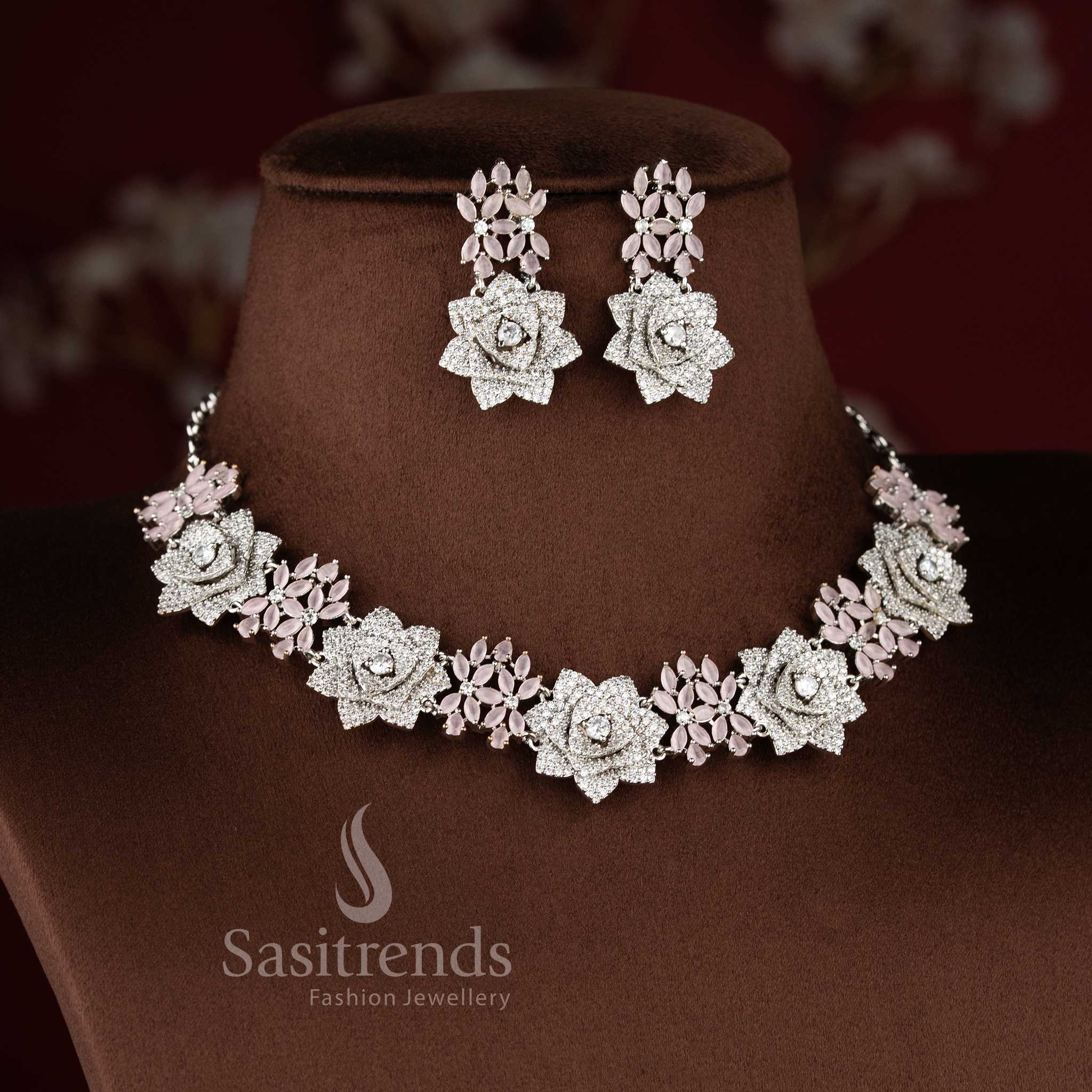 Blush rose opulence radiates through this grand floral design American diamond jewellery set in baby-pink with rhodium silver plating, ideal for high society celebrations – Sasitrends