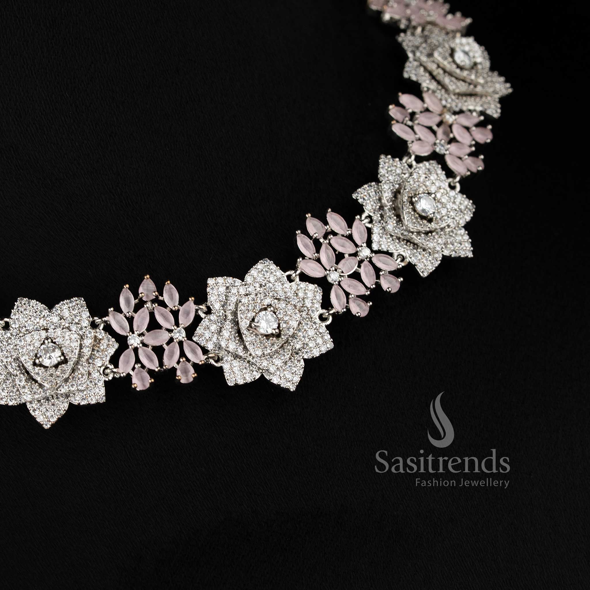 Blush rose opulence radiates through this grand floral design American diamond jewellery set in baby-pink with rhodium silver plating, ideal for high society celebrations – Sasitrends