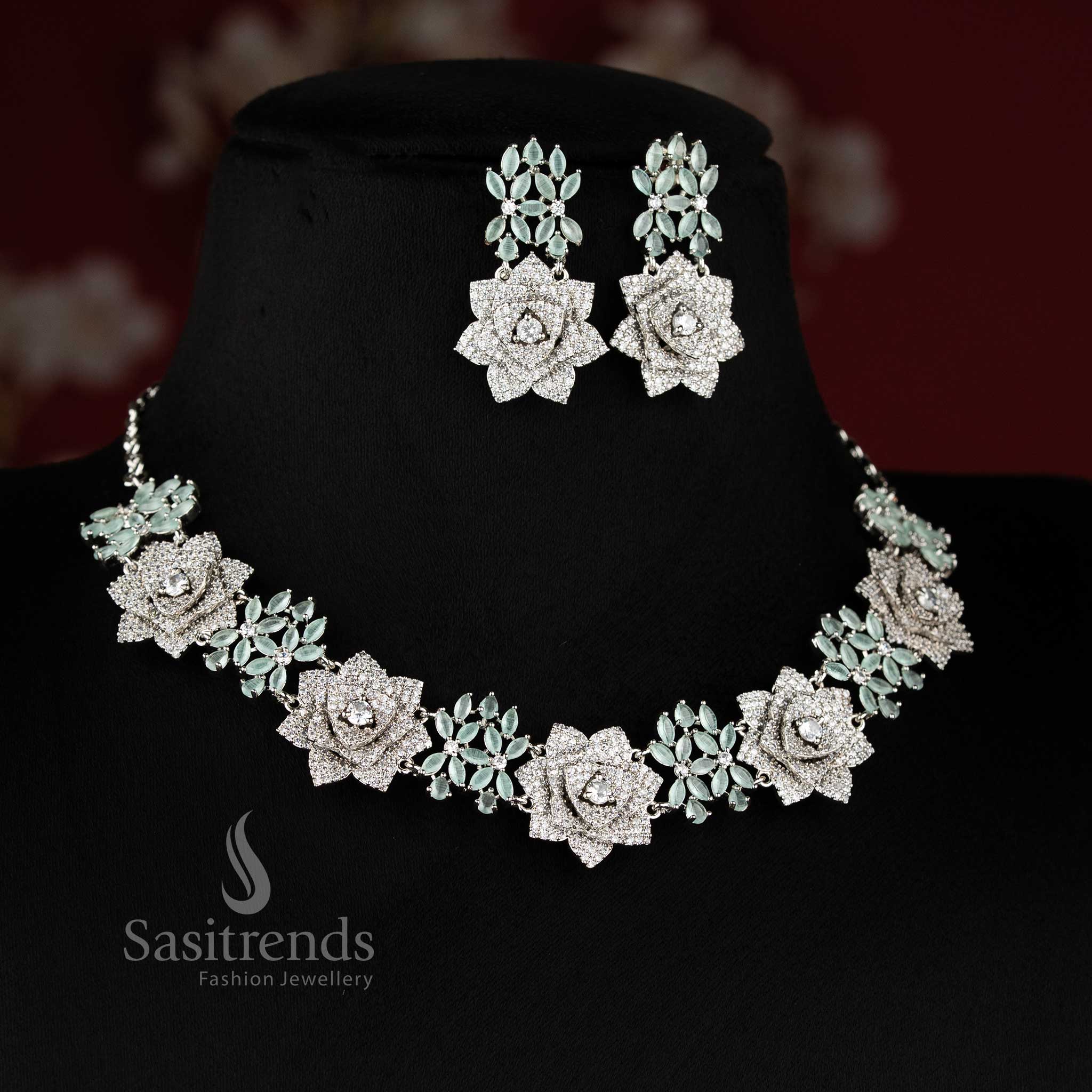 Blush rose opulence radiates through this grand floral design American diamond jewellery set in Mint with rhodium silver plating, ideal for high society celebrations – Sasitrends