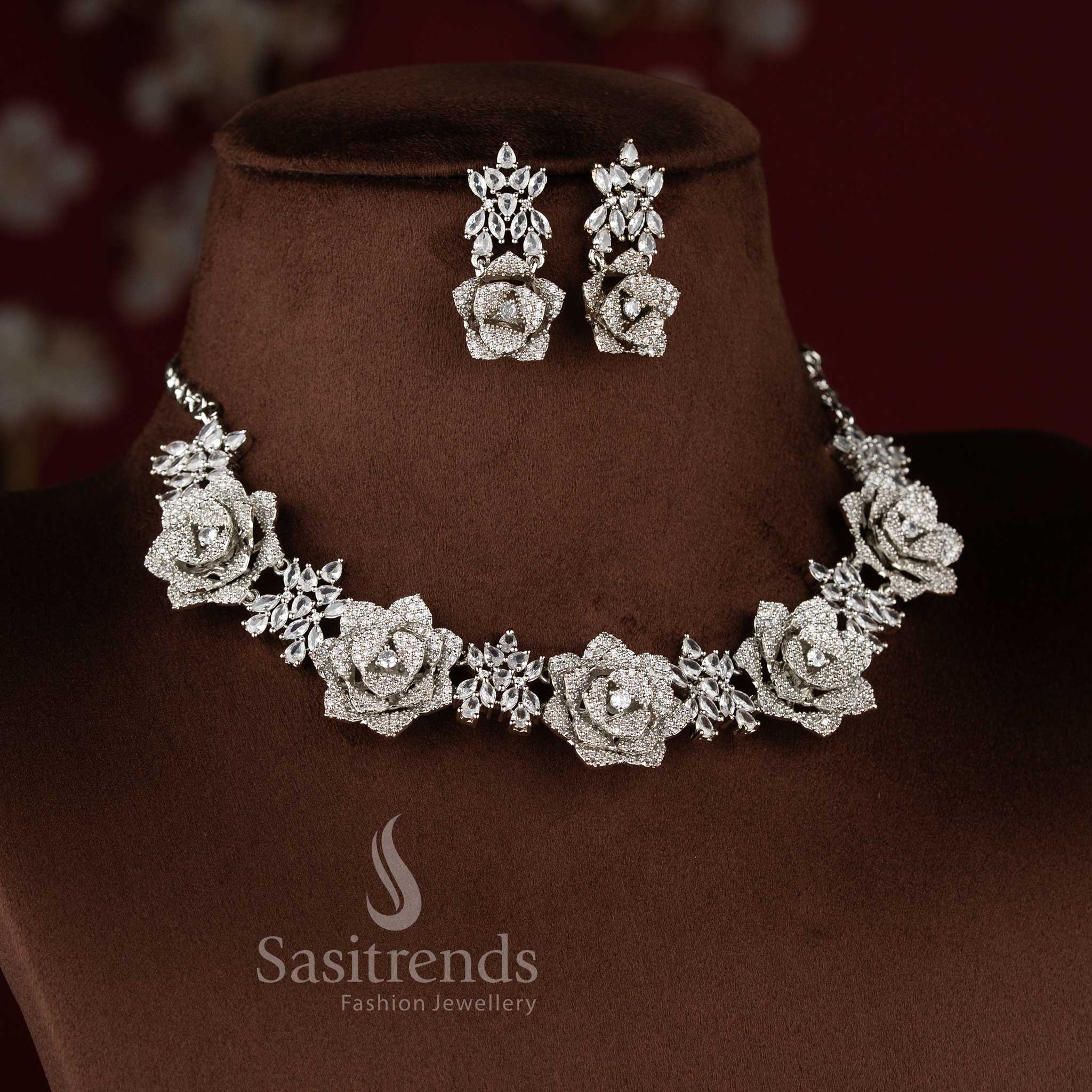 Blush rose opulence radiates through this grand floral design American diamond jewellery set in white with rhodium silver plating, ideal for high society celebrations – Sasitrends