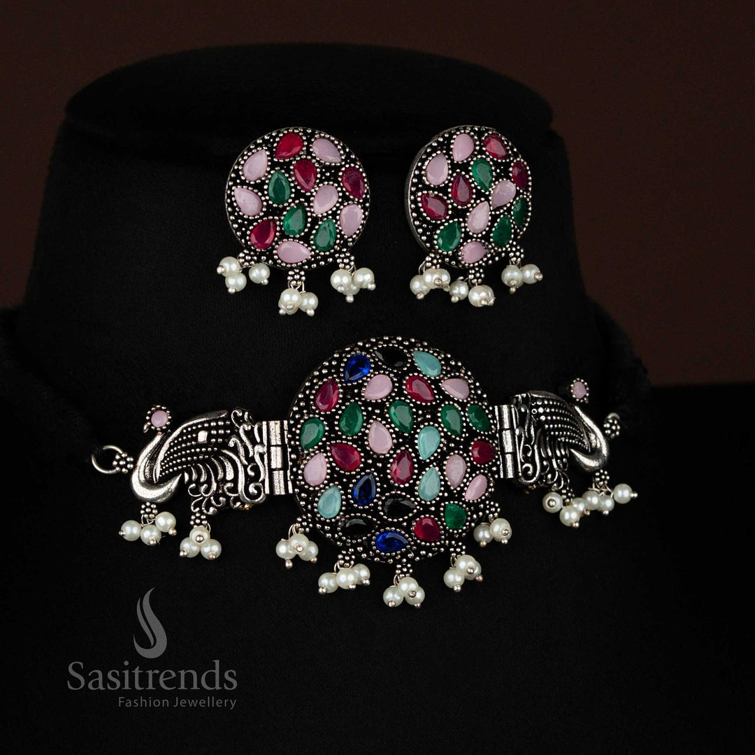  Oxidised choker with Multi colors stone-studded peacock centrepiece and pearl earrings, a lively fusion jewellery set in silver tone – Sasitrends