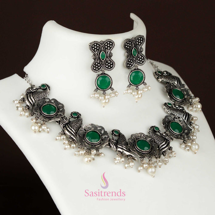 Oxidised silver green stone jewellery featuring peacock and floral motifs, a pearl drop necklace and earrings set crafted for timeless appeal – Sasitrends