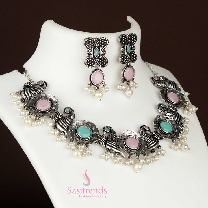 Elegant pink-mint pearl oxidised silver jewellery set featuring peacock and floral elements for a trendy festive look – Sasitrends