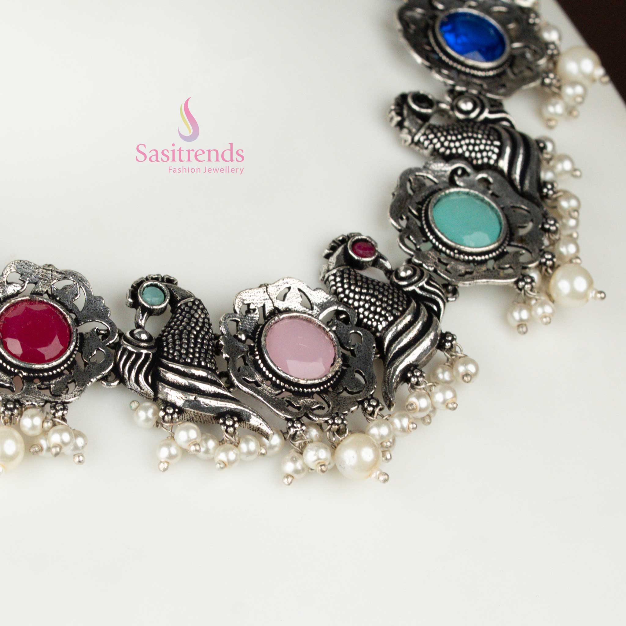 Vibrant multi-stone oxidised necklace with pearl drops, floral and peacock motifs—an elegant festival favourite jewellery set – Sasitrends