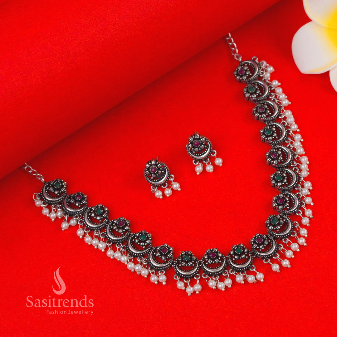 Vibrant Ruby Green Pearl Oxidised Set with Stylish Moon Design and Jhumkas – Festive Wear Statement Jewellery by Sasitrends