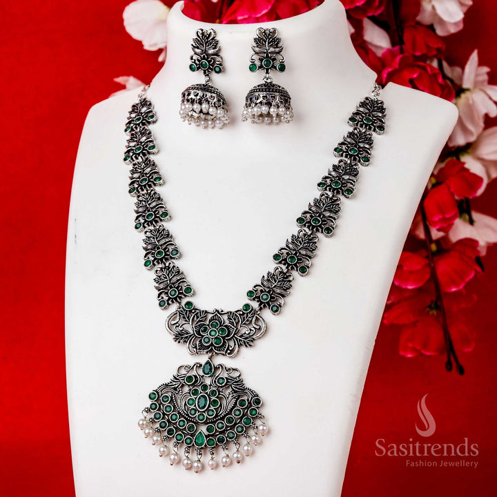 Green stone party wear floral necklace set with jhumkas in oxidised silver and pearl drops, ideal for festive gatherings – Sasitrends