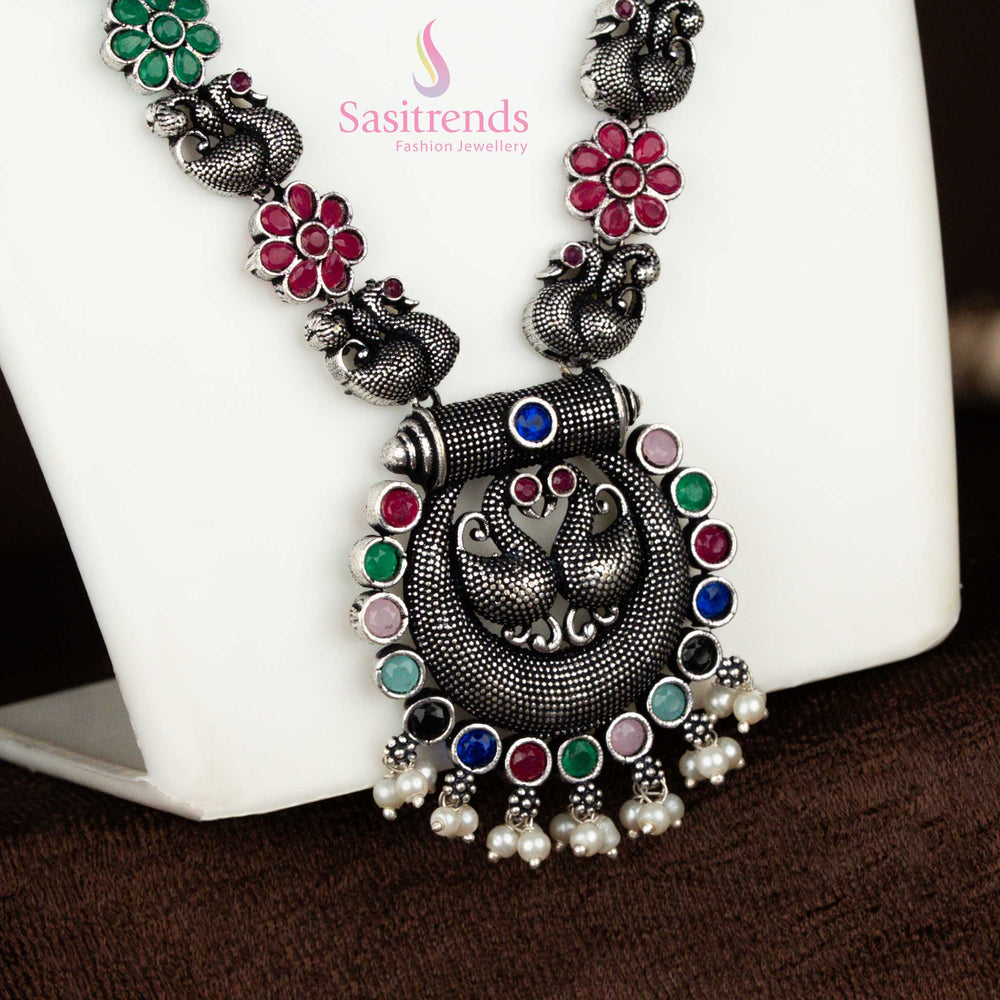 Artisan-crafted peacock motif chandbali pendant necklace in oxidised silver with multi-colour stones and traditional earrings, a vintage-inspired jewellery set – Sasitrends
