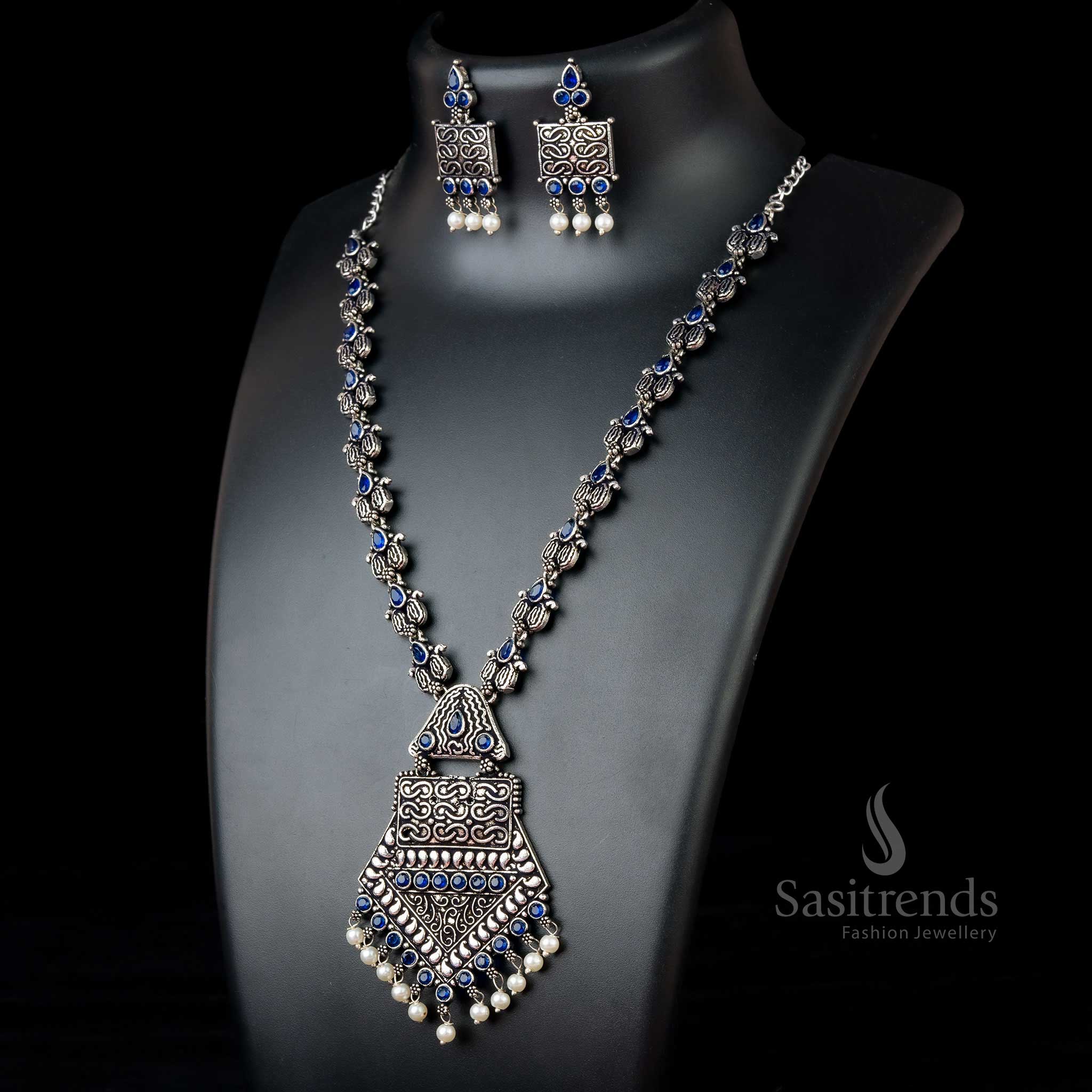 Lustrous Blue Tribal Stones Necklace in oxidised silver with ethnic design pendant and pearl danglers – Unique jewellery for festive moments by Sasitrends
