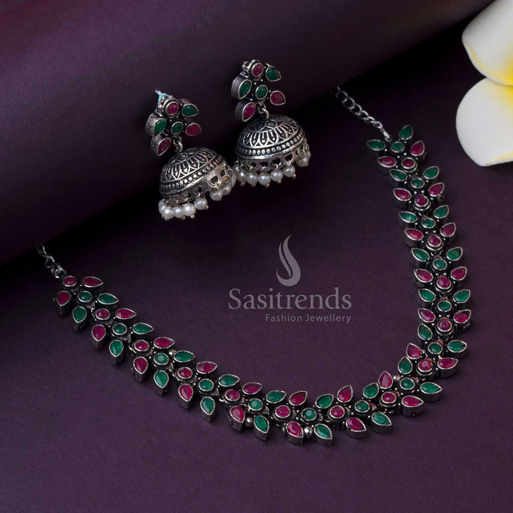 Oxidised dual-tone ruby-green stone jewellery with pearl jhumkas, perfect for festive occasions with traditional celebration styling by Sasitrends