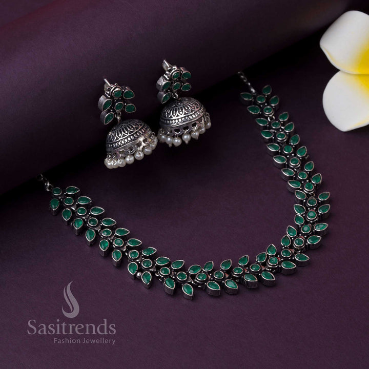 Green oxidised jewellery set in Madhavi design with pearl jhumkas, crafted for a bold party look and rustic beauty, merging tradition and modern fusion by Sasitrends