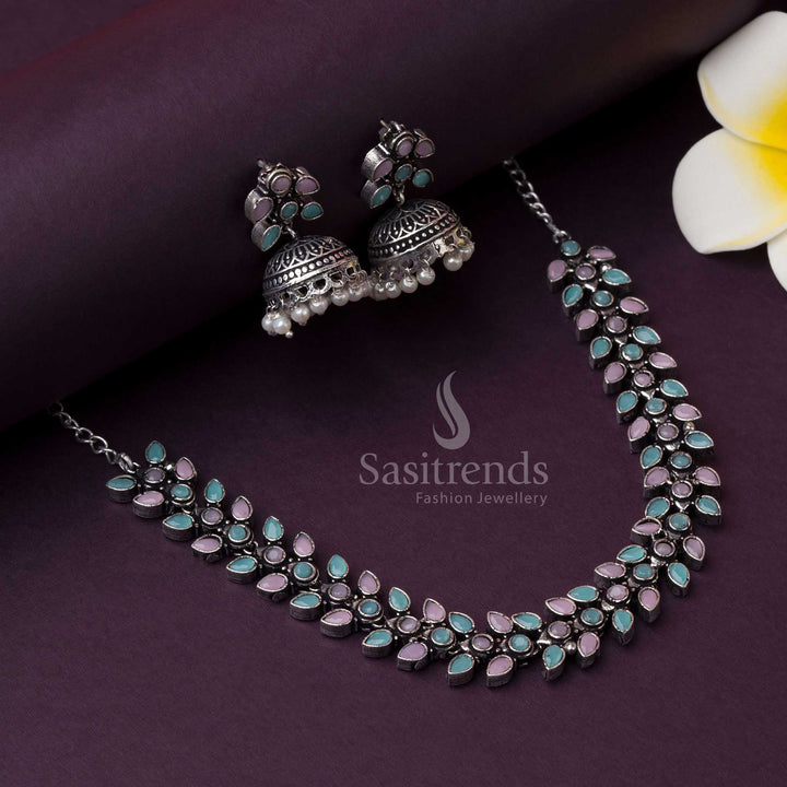 Oxidised Madhavi jewellery set with mint and pink stones, styled with pearl drops and colourful celebration tones, perfect for a subtle party vibe by Sasitrends