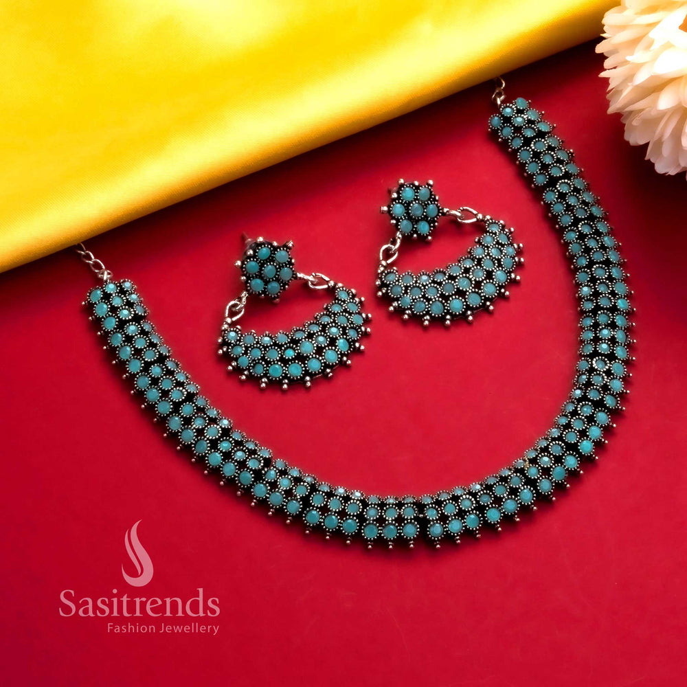 Stylish oxidised mint stones necklace set with intricate silver earrings, designed for a chic festive look - Sasitrends