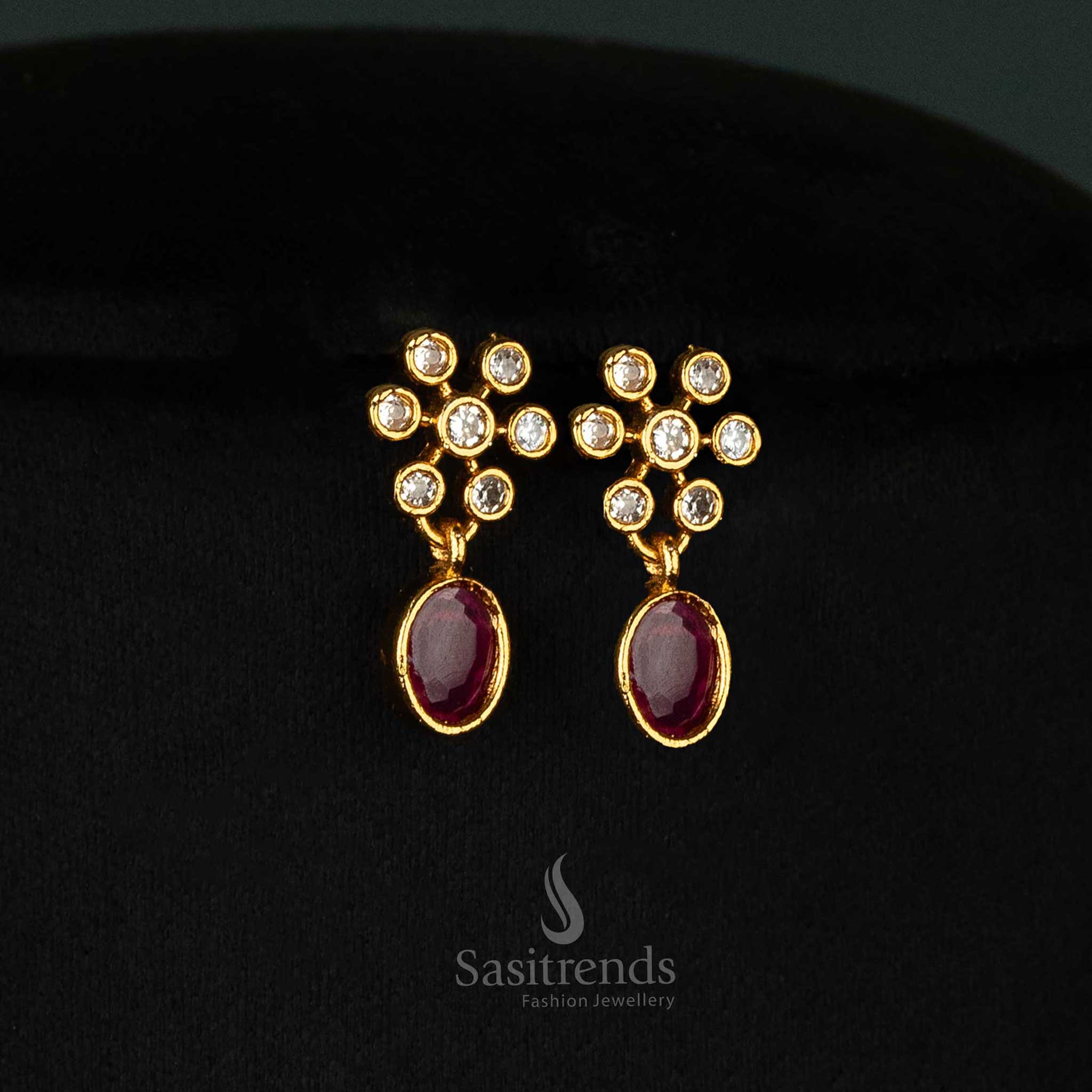 Trendy temple matte gold-plated jewellery set with flower and oval patterns, ruby accents, and sparkling American diamonds, perfect for women - Sasitrends