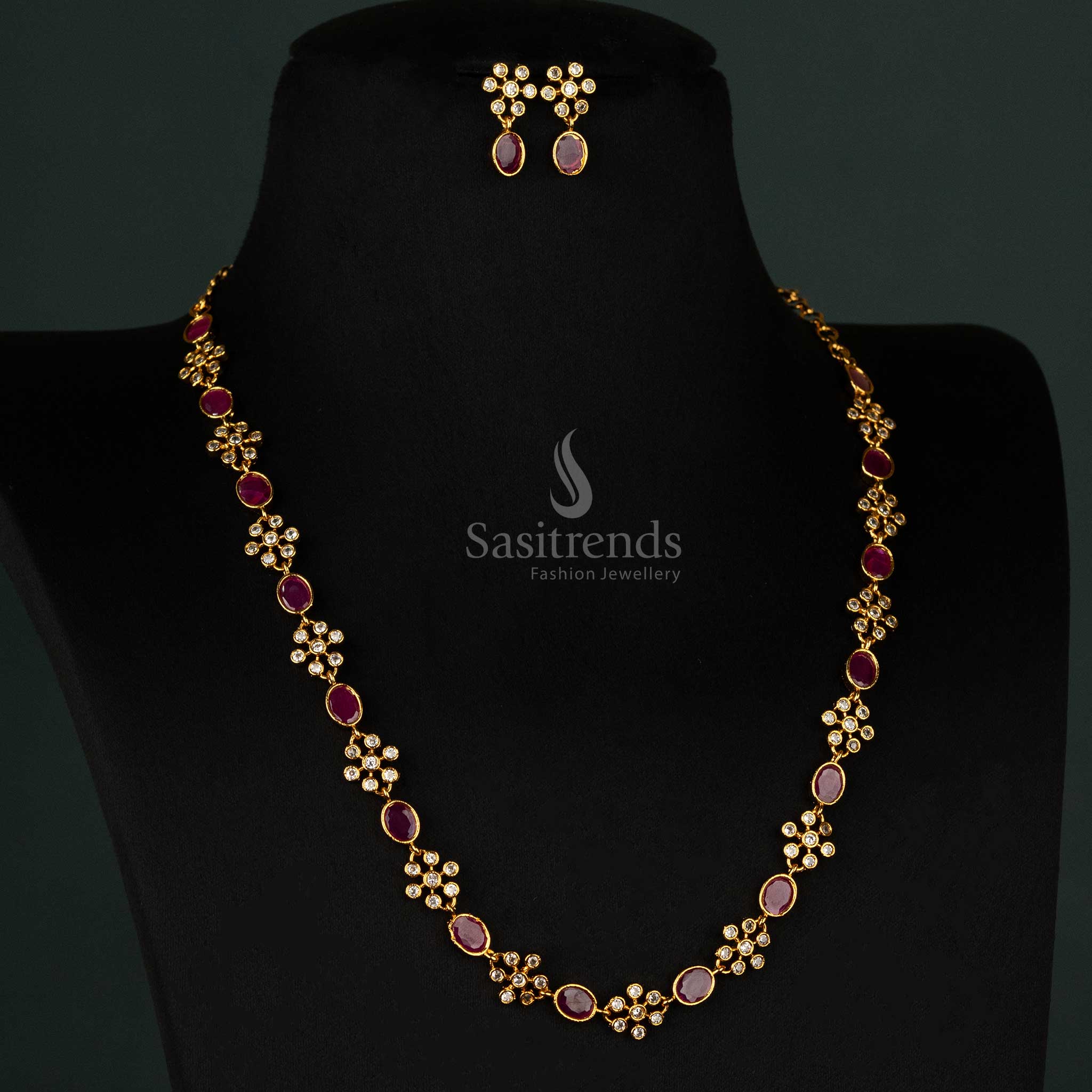 Trendy temple matte gold-plated jewellery set with flower and oval patterns, ruby accents, and sparkling American diamonds, perfect for women - Sasitrends