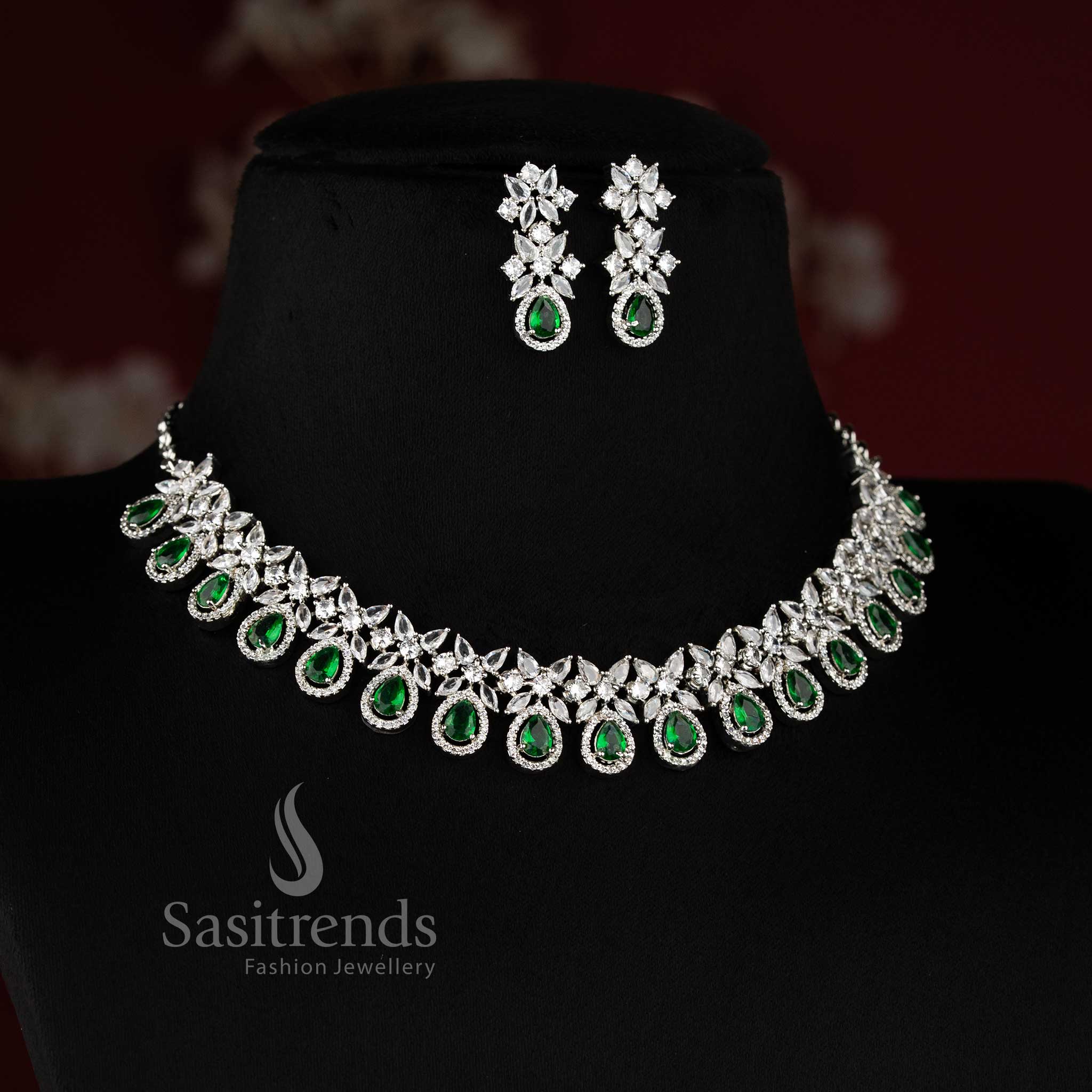 Trendy rhodium silver and rose gold American Diamond Green stone necklace set by Sasitrends.