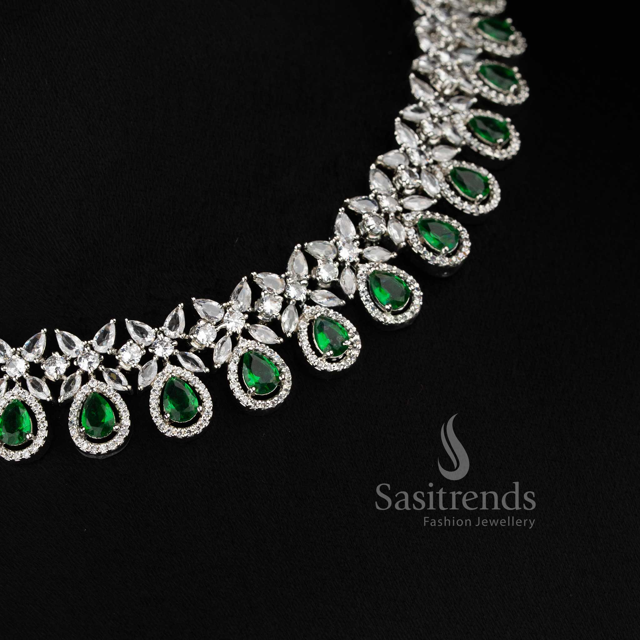 Trendy rhodium silver American Diamond Green stone necklace set by Sasitrends.