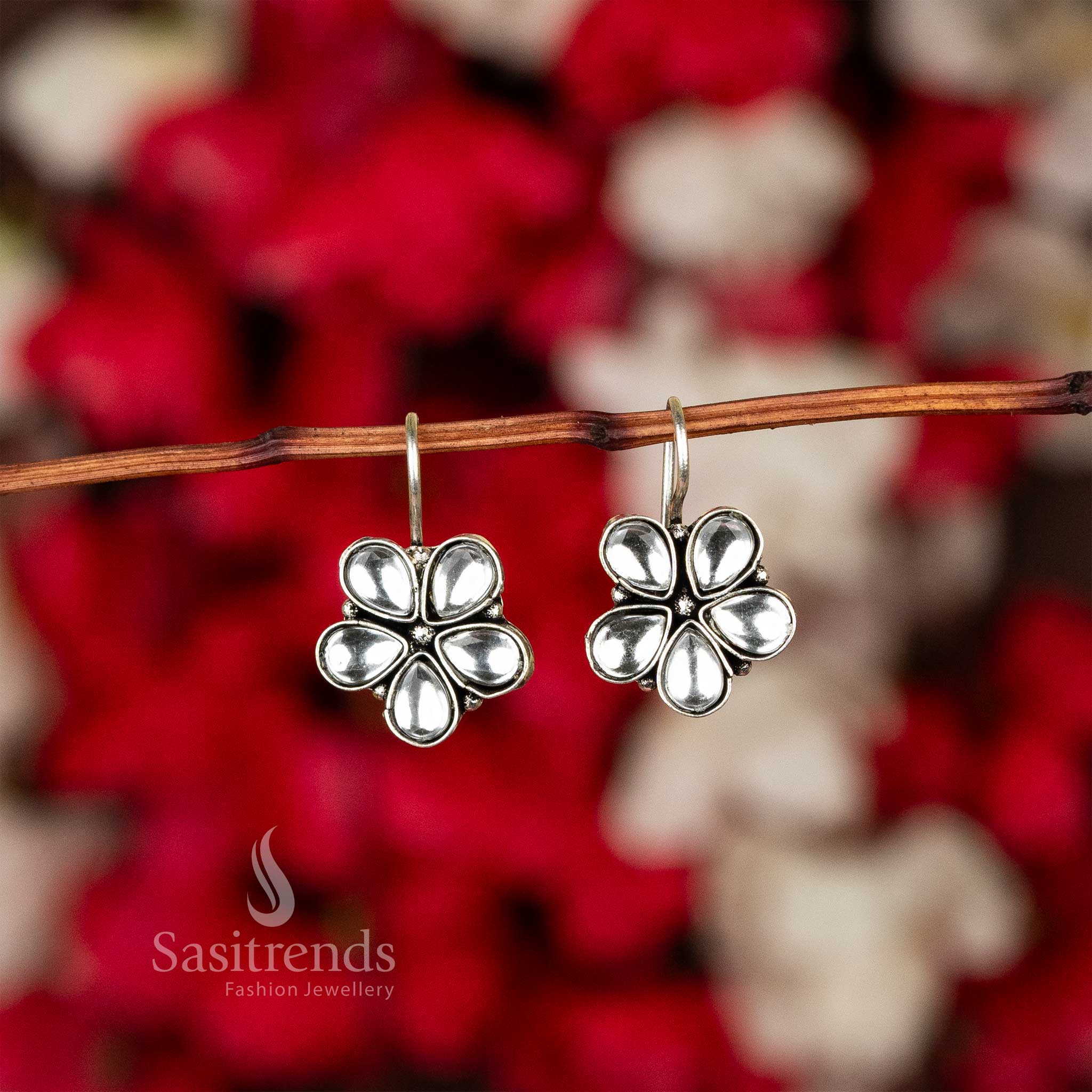 Latest oxidised petal-shaped earrings with white stone accents on fishhook backs