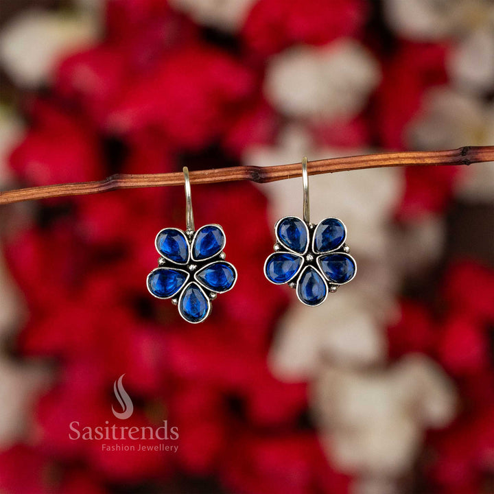 Oxidised petal-shaped earrings with blue stone accents on fishhook backs navarathiri special sasitrends