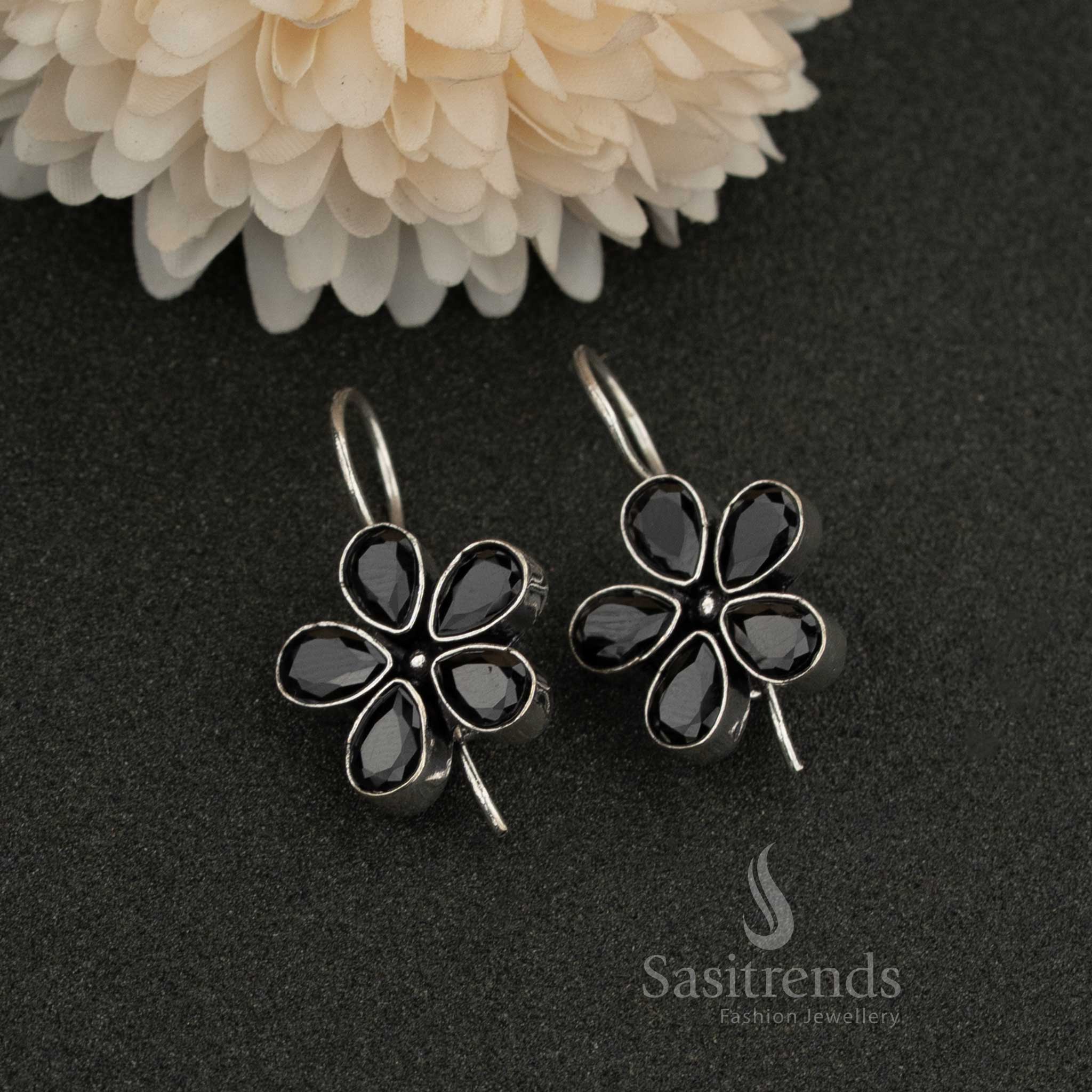 Oxidised petal-shaped earrings with Black stone accents on fishhook backs navarathiri elegance