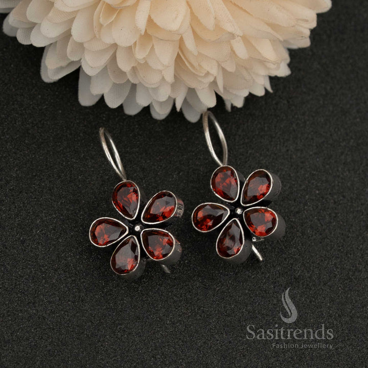 Oxidised petal-shaped earrings with Red  stone accents on fishhook backs navarathiri elegance