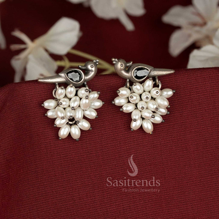 Artistic Oxidised German Silver Parrot Motif Stone Earrings with Pearls for Chic Ethnic-Casual Styling – Sasitrends