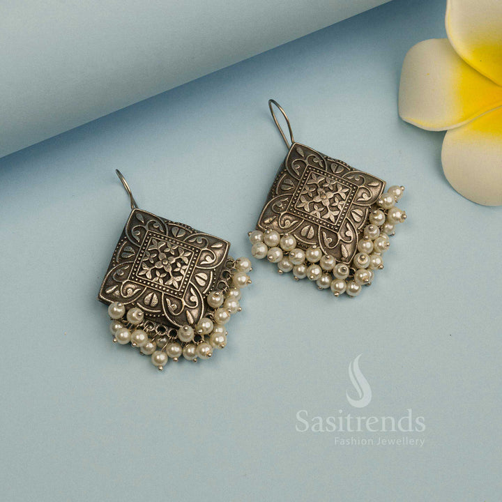 Elegant oxidised silver look like earrings with pearl drops, crafted for festive gatherings and stylish party wear jewellery collections – Sasitrends