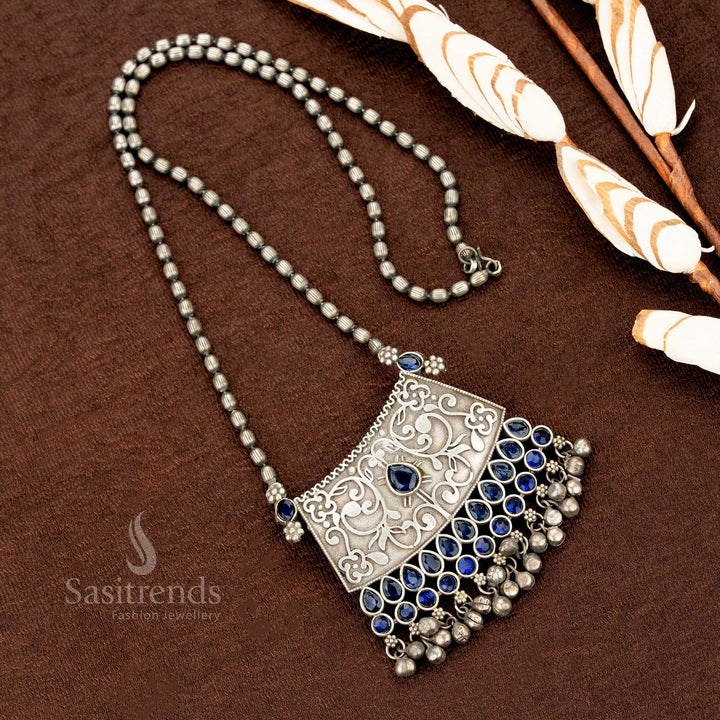 Engraved floral pendant necklace in oxidised silver with vibrant blue stone and antique tribal links, perfect for ethnic style – Sasitrends