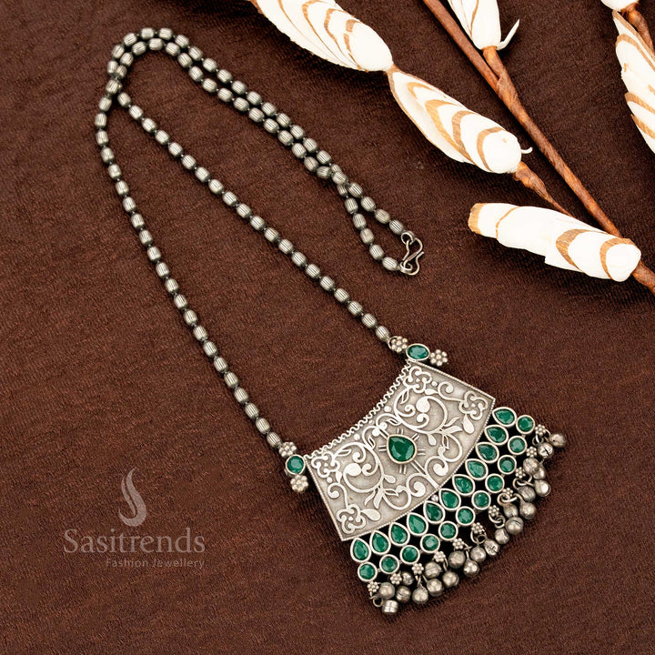 Green stone oxidised floral pendant necklace with engraved antique chain design, perfect for tribal-inspired ethnic jewellery lovers – Sasitrends