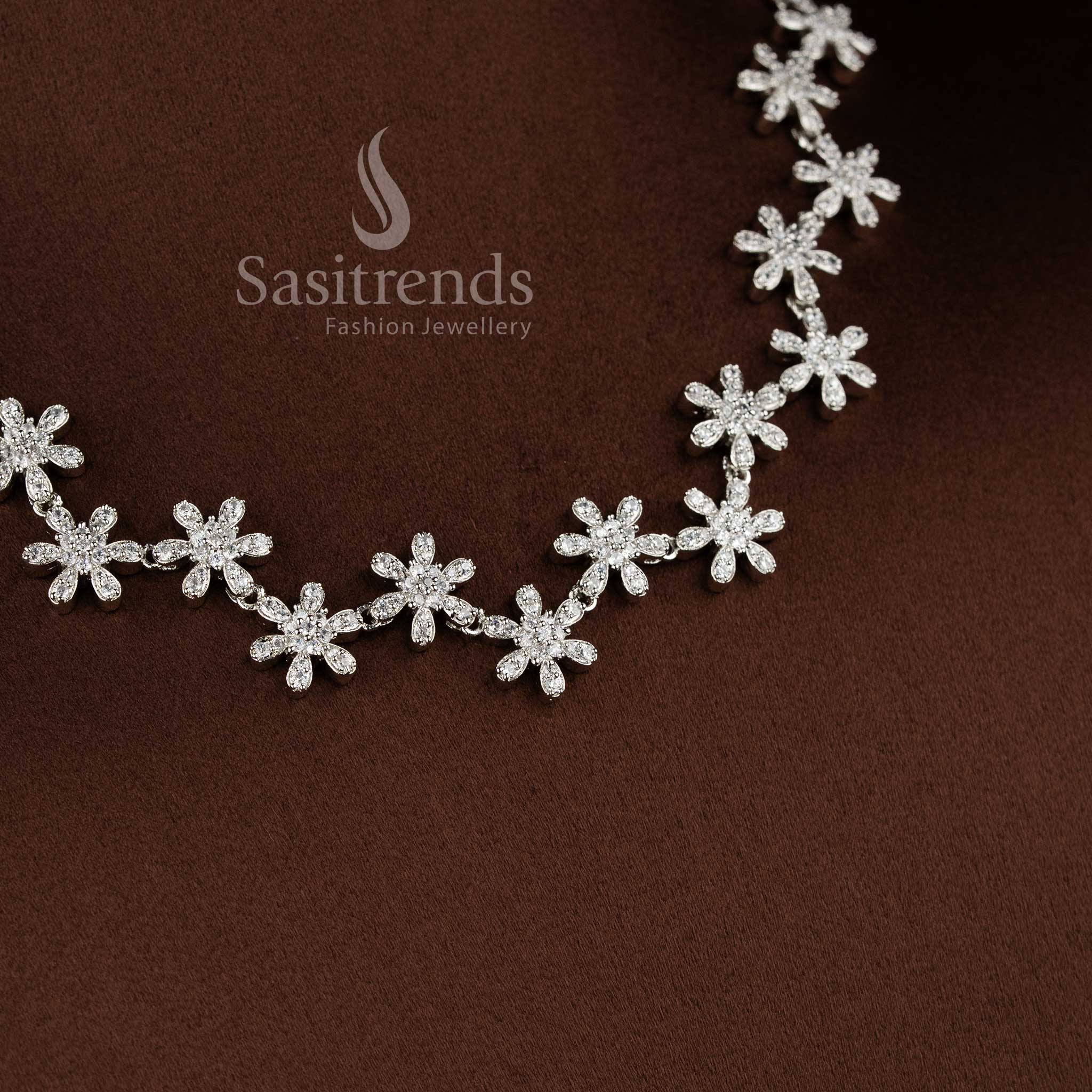 Bridal rhodium silver necklace set with white American diamonds and intricate design by Sasitrends.