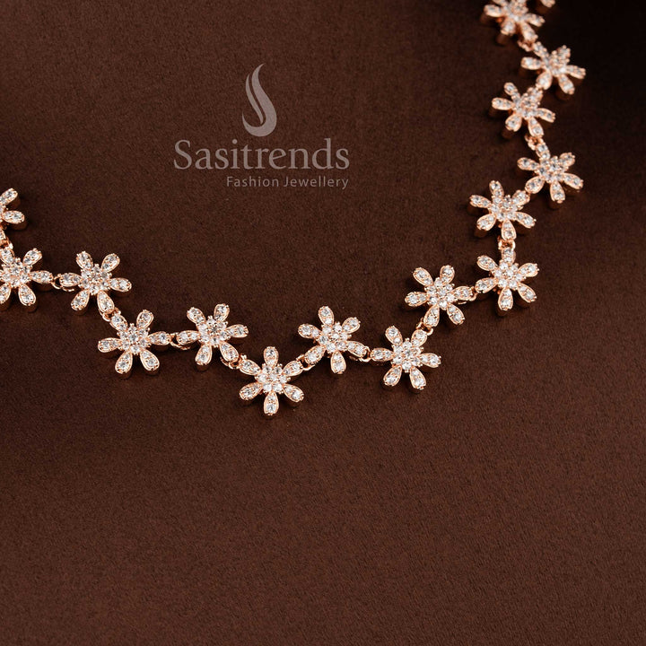 Party Wear rose gold tone necklace jewellery set with white AD stones and matching earrings.