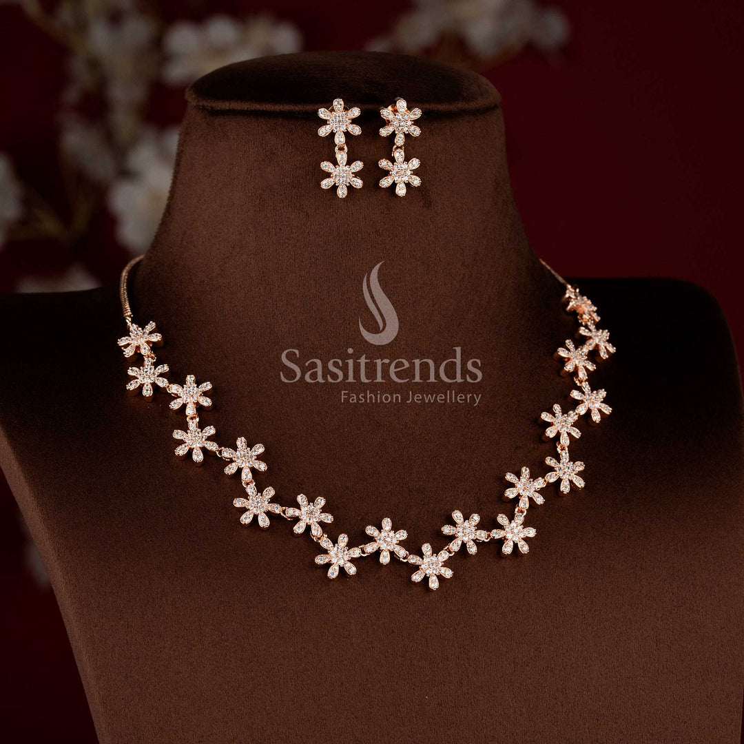 Traditional rose gold tone necklace jewellery set with white AD stones and matching earrings.