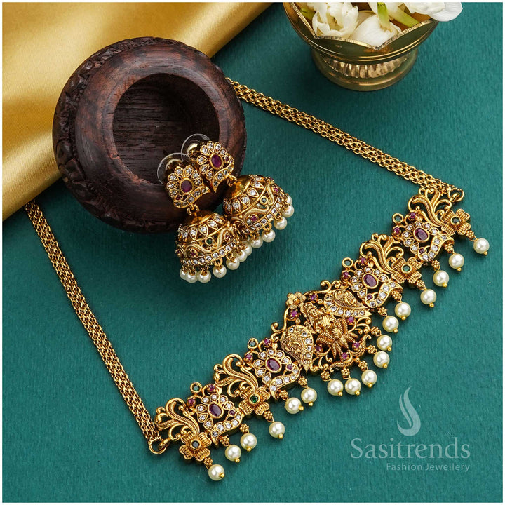 Elegant Temple Matte Gold Plated Peacock Lakshmi Choker Jewellery Set with Lotus Motif and AD Stones | Sasitrends