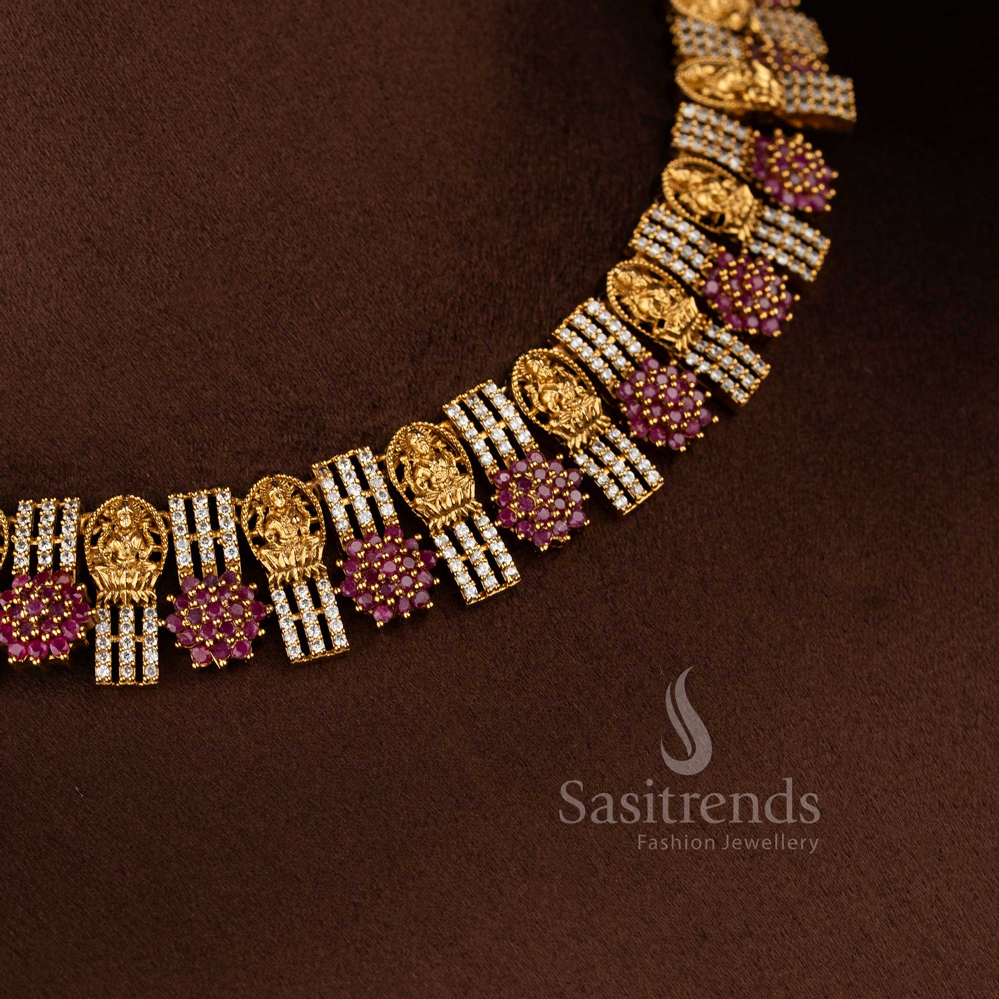 Elegant temple jewellery necklace crafted with Lakshmi motifs and sparkling floral AD stone design - Sasitrends