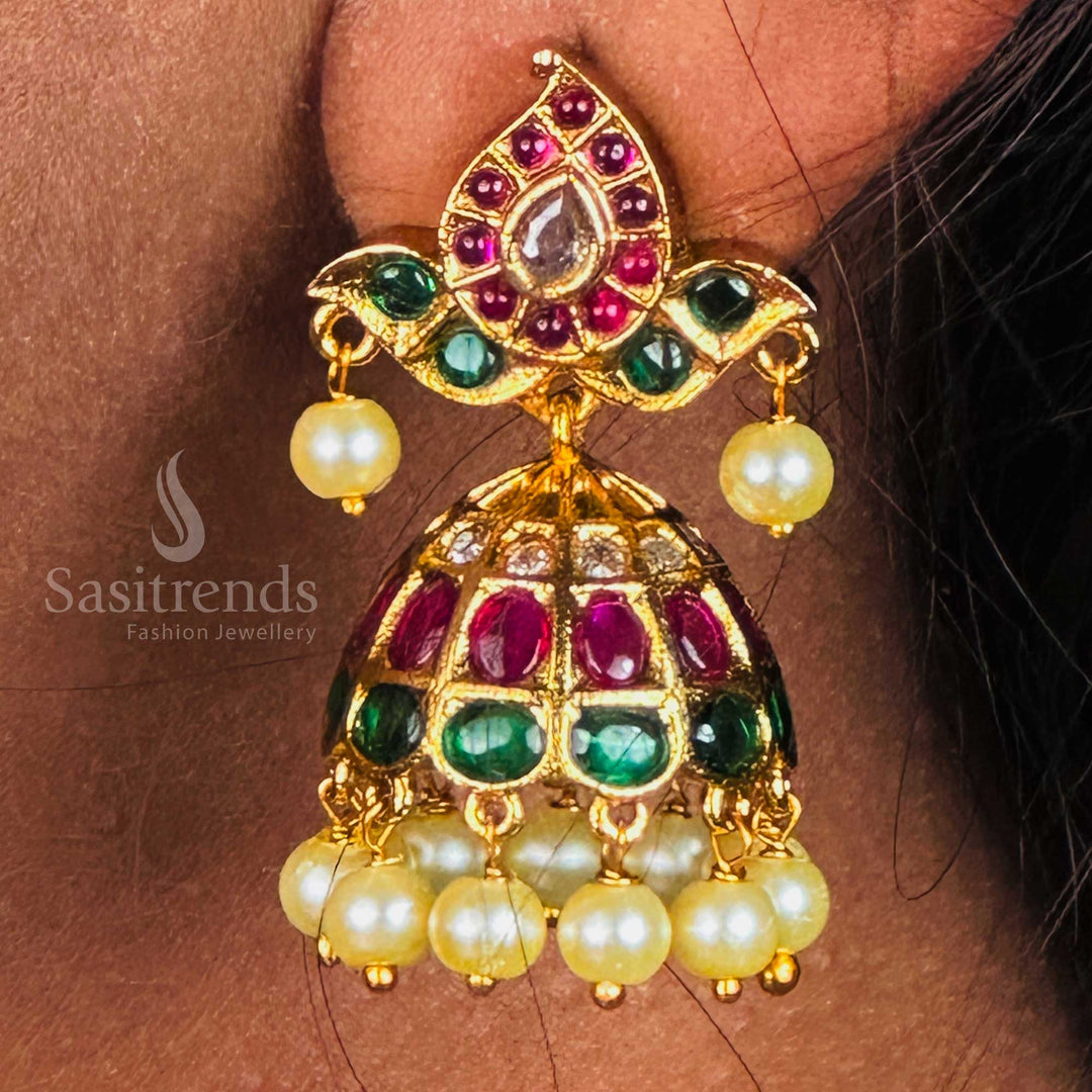 Temple matte gold plated charming AD-studded jhumka earrings with pearl hangings, designed in elegant South Indian ethnic style for weddings and divine occasions – Sasitrends