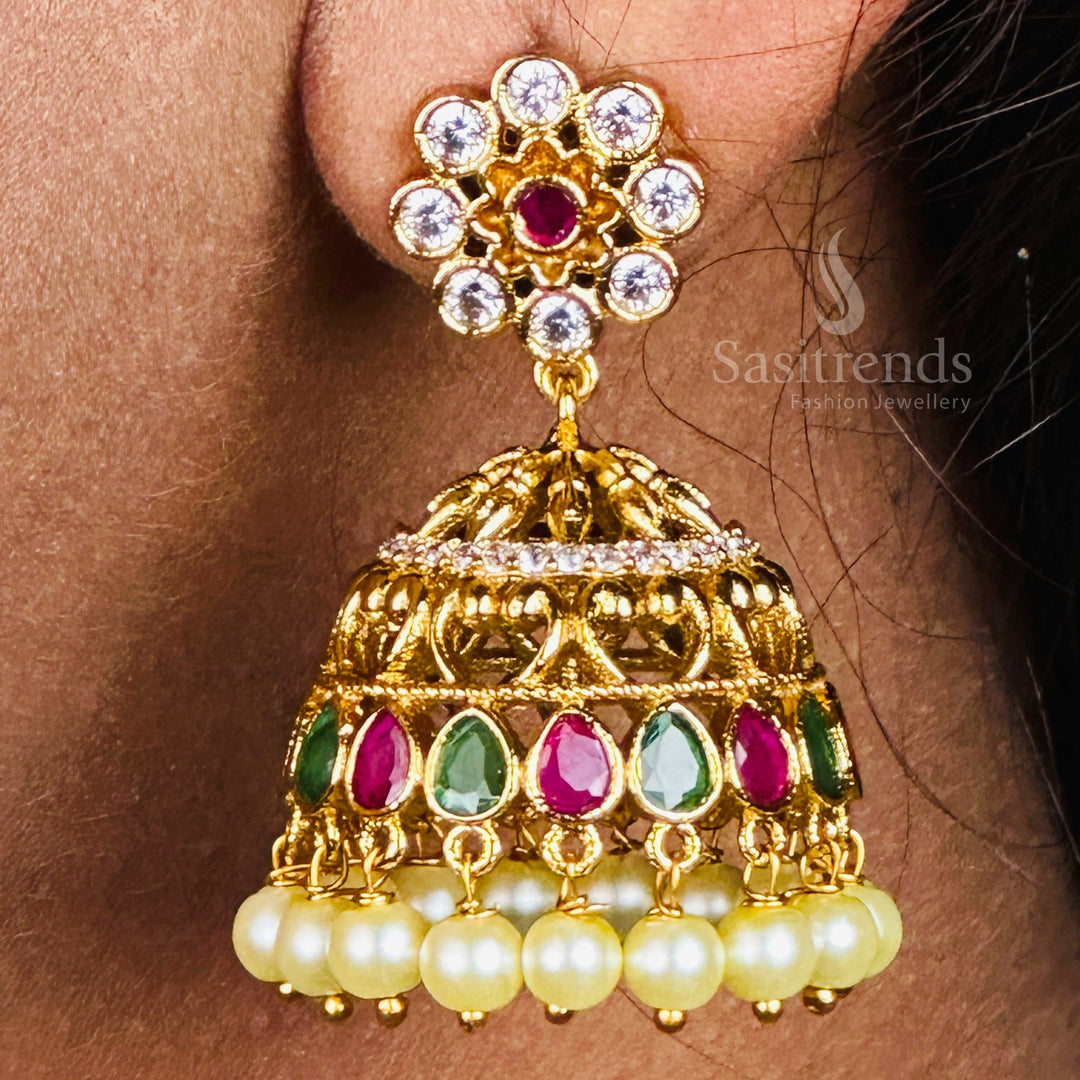 Heritage-style matte gold temple jhumka earrings with sparkling Multi AD stones and pearl hangings, featuring a rich classic finish and timeless traditional jewellery artistry – Sasitrends