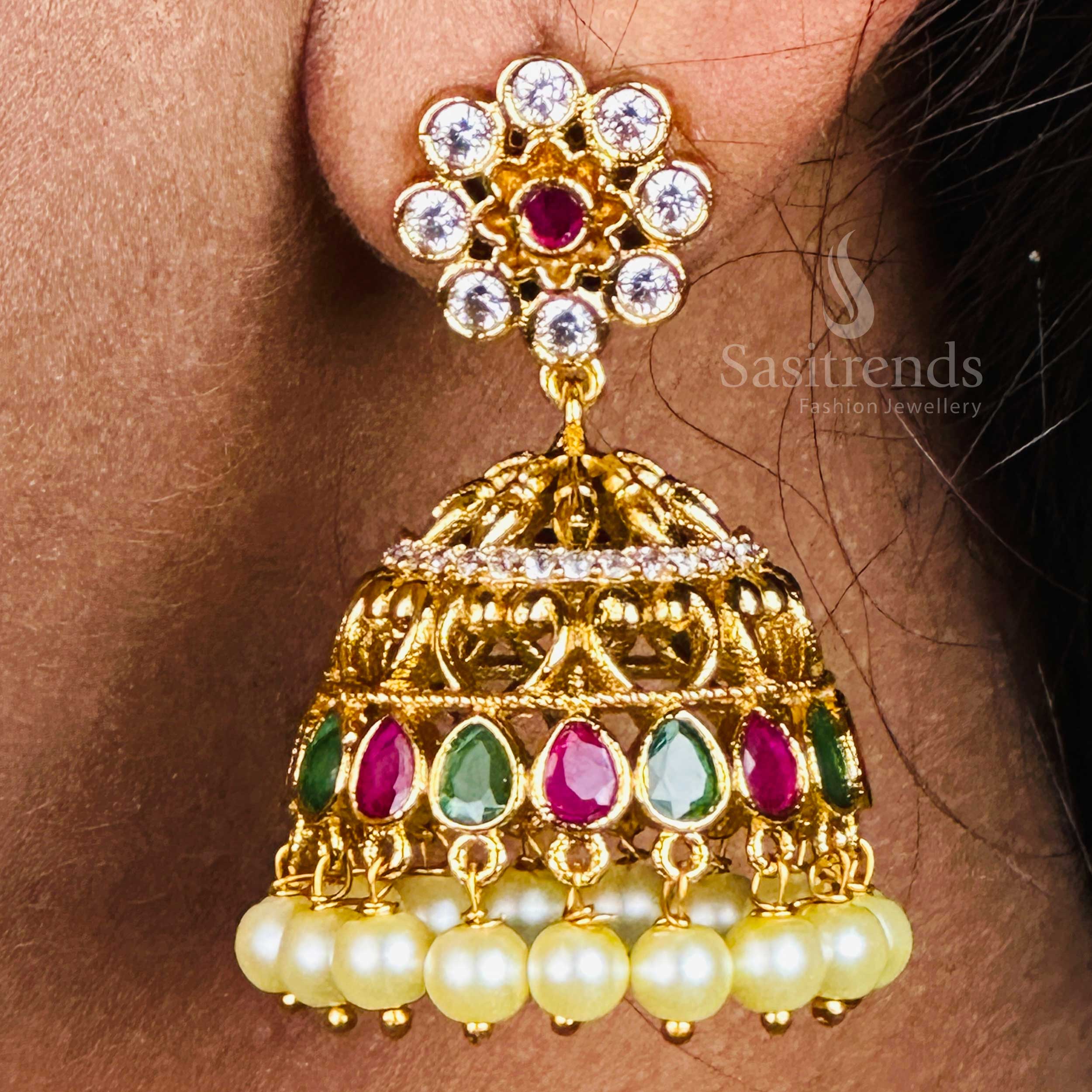 Heritage-style matte gold temple jhumka earrings with sparkling Multi AD stones and pearl hangings, featuring a rich classic finish and timeless traditional jewellery artistry – Sasitrends