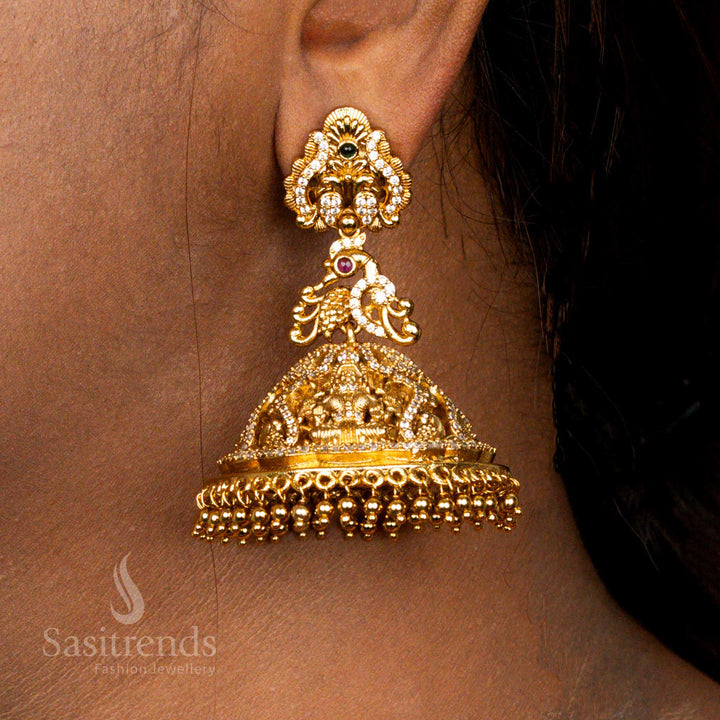 Premium Matte Gold Plated Lakshmi Peacock Ad Jhumka Earrings , Wedding Temple Wear - Sasitrends 