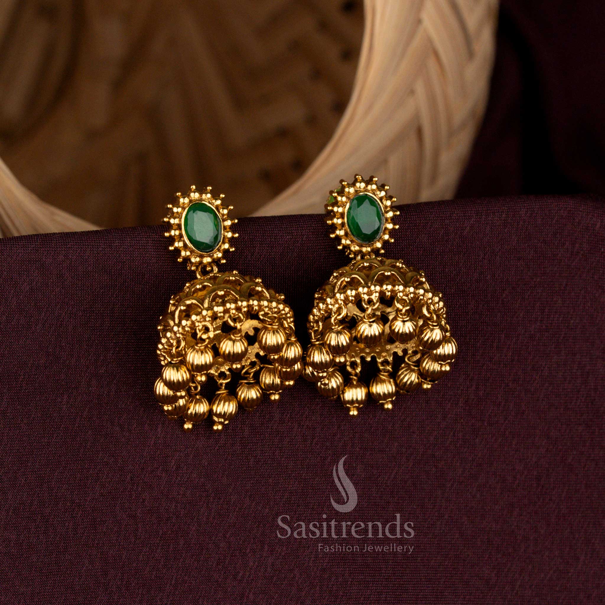 Distinguished matte gold oval stud temple jhumka earrings with bead danglers sasitrends