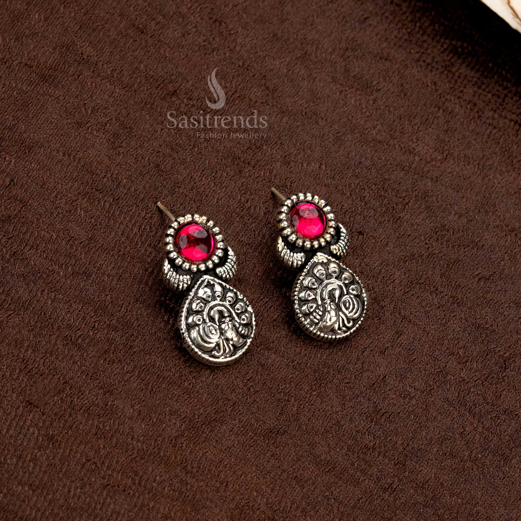 Intricately designed oxidised earrings set with an artistic pendant - Sasitrends