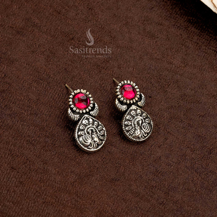 Intricately designed oxidised earrings set with an artistic pendant - Sasitrends