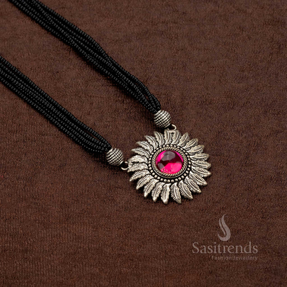 Stylish oxidised necklace featuring a bold sunburst pendant design - Sasitrends