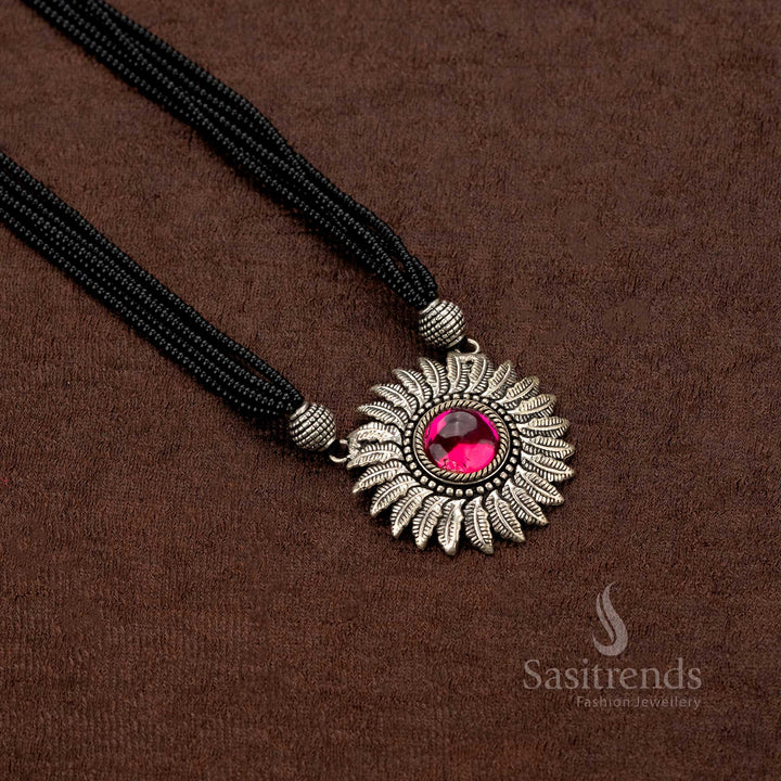 Stylish oxidised necklace featuring a bold sunburst pendant design - Sasitrends