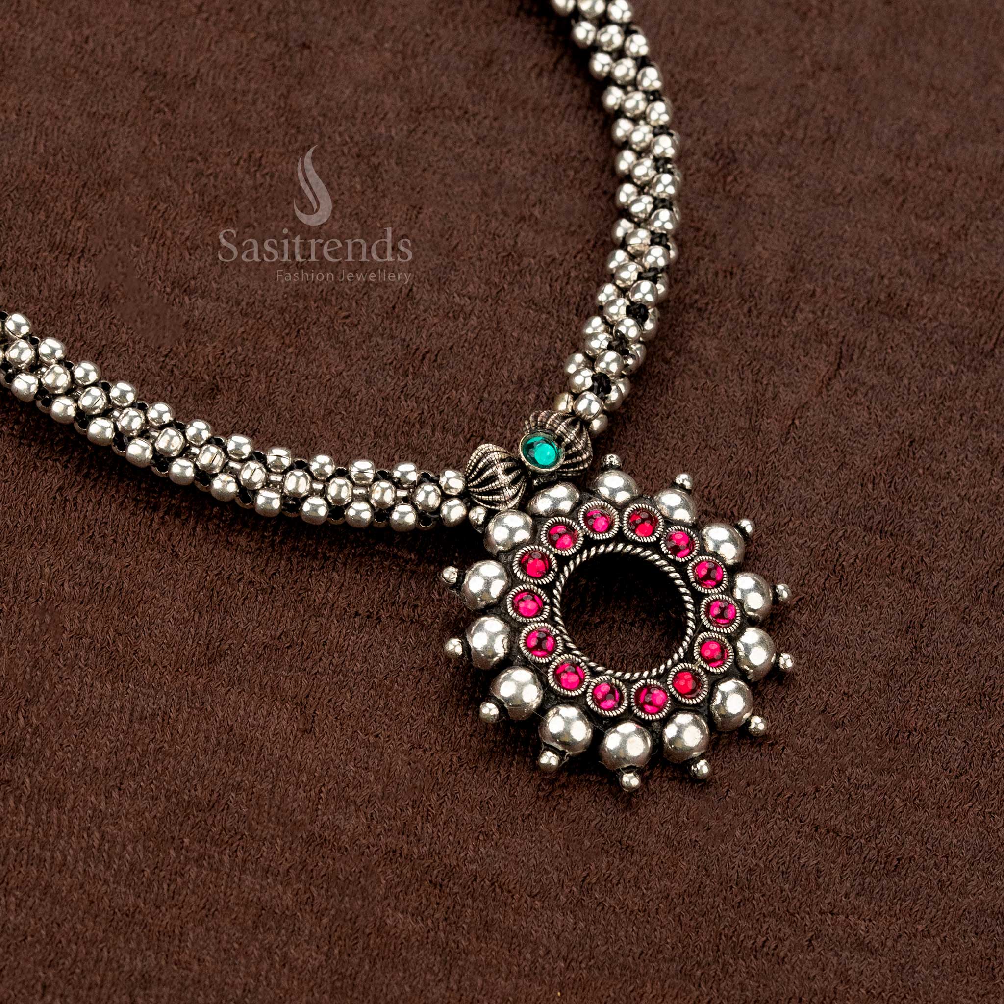 Beautiful oxidised jewellery set featuring a circular sunburst pendant - Sasitrends